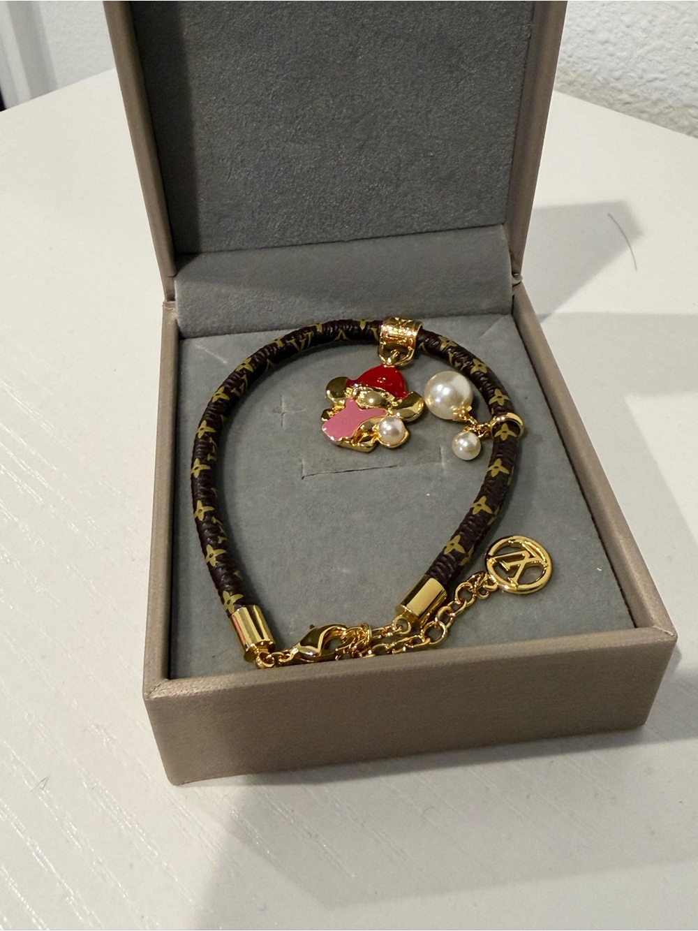 Lv Gold-Tone Charm Bracelet with Pink & Red Enamel Accents